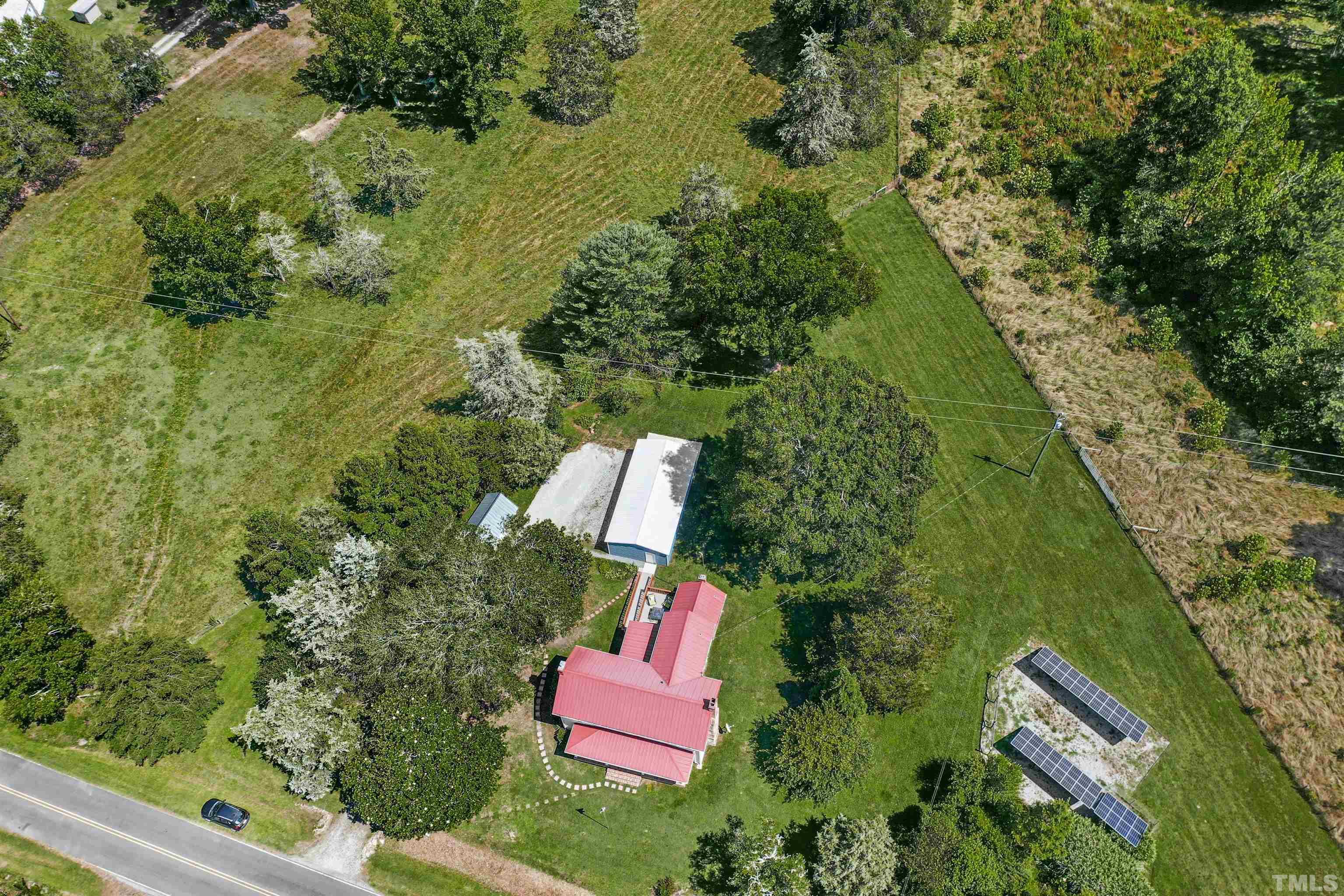 4610 Hall Road Rougemont, NC 27572 - Photo 41 of 43 an aerial view of residential house with outdoor space and trees all around