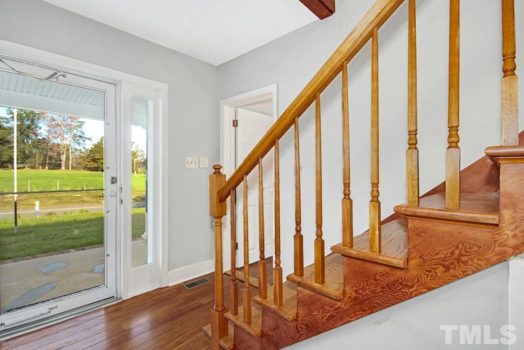 4610 Hall Road Rougemont, NC 27572 - Photo 8 of 43 a view of an entryway with wooden floor and door