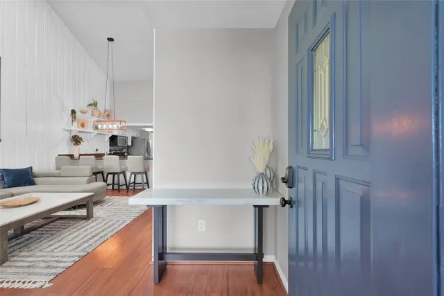 a living room with furniture and a table