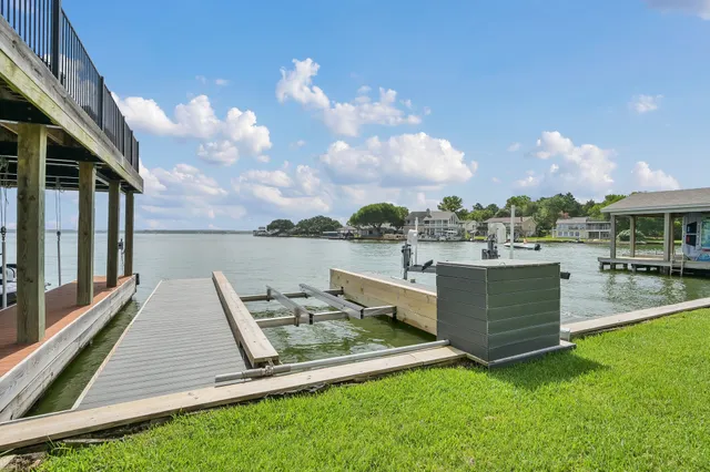 a view of a swimming pool with a lounge chairs