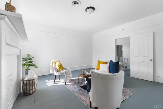 a living room with furniture and a couch