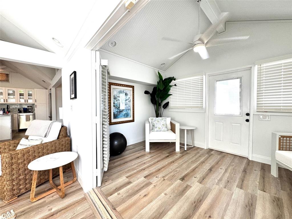 701 Broadway Street Longboat Key, FL 34228 - Photo 15 of 33 a living room with furniture and a table