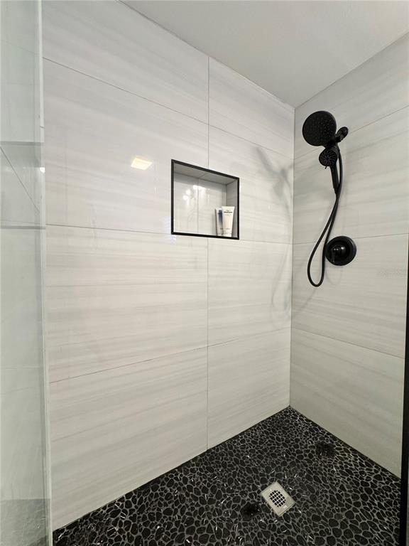 701 Broadway Street Longboat Key, FL 34228 - Photo 18 of 33 a bathroom with a shower
