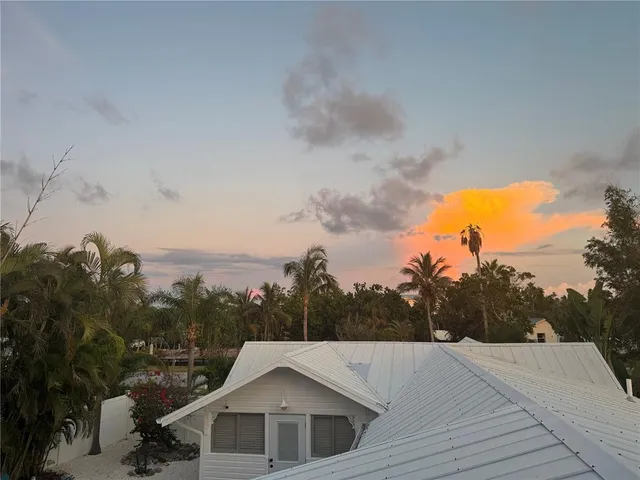 a view of a house with a big yard
