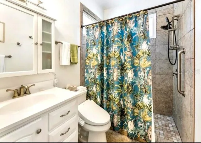 a bathroom with a sink and toilet