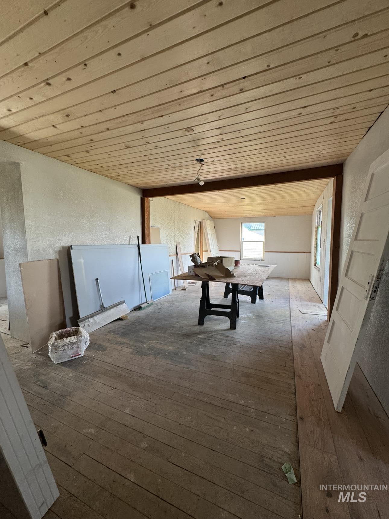 40336 Sr 129 Anatone, WA 99401 - Photo 19 of 29 Corridor featuring wooden ceiling, hardwood / wood-style floors, and an upstairs landing