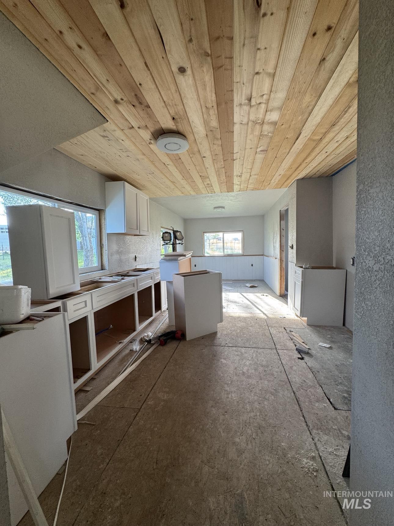 40336 Sr 129 Anatone, WA 99401 - Photo 24 of 29 Kitchen with white cabinets and wood ceiling