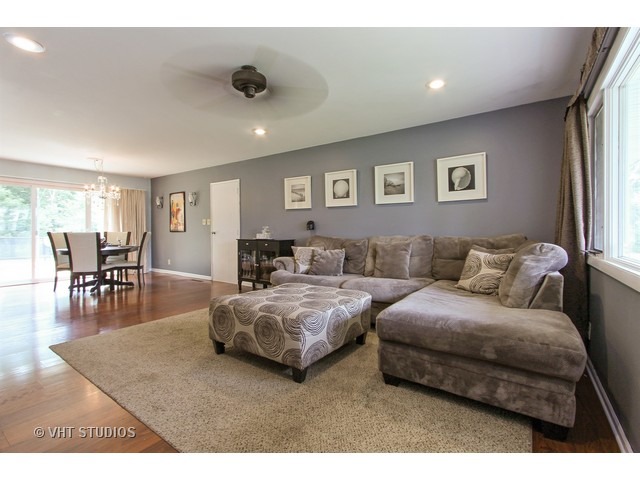 115 East Oltendorf Road Streamwood, IL 60107 - Photo 2 of 10 a living room with furniture and a table