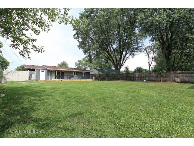 115 East Oltendorf Road Streamwood, IL 60107 - Photo 10 of 10 a aerial view of a house with a yard