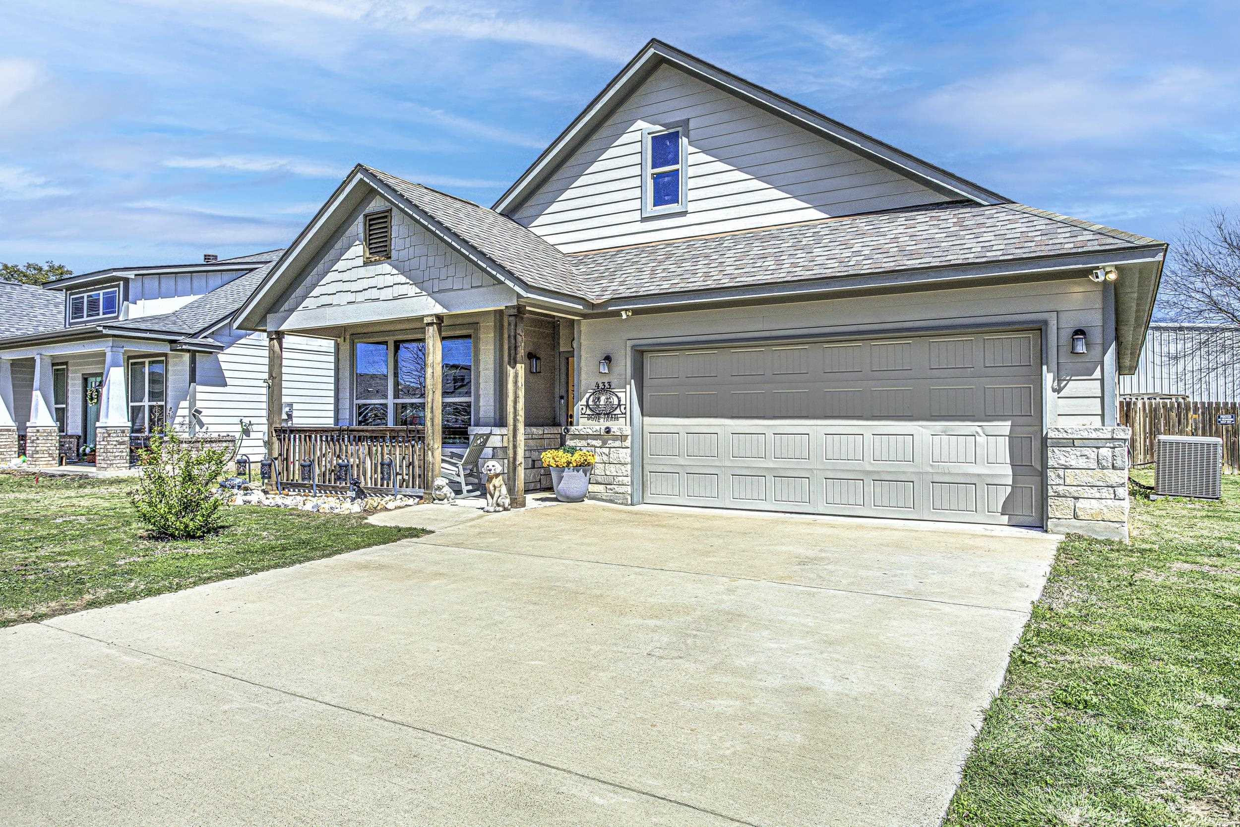 a front view of a house with yard
