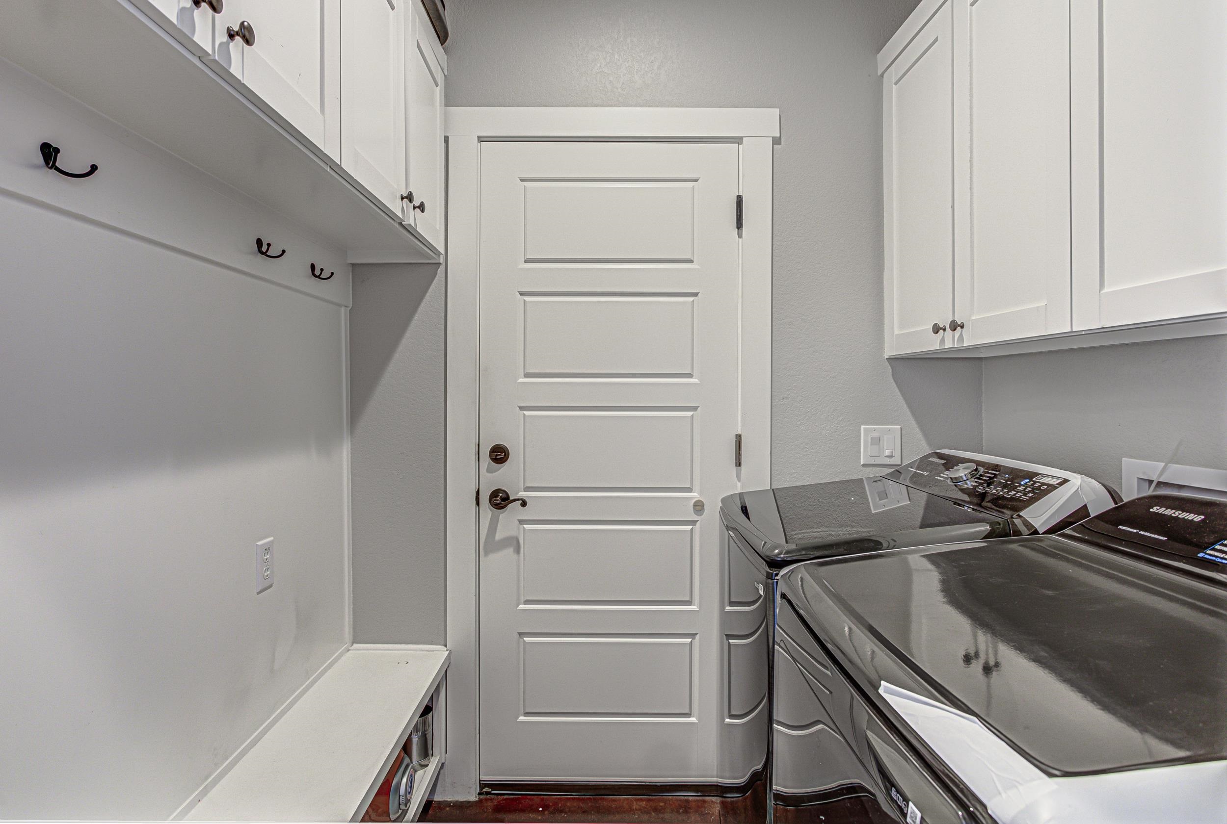 433 Dove Trail Bertram, TX 78605 - Photo 18 of 30 a kitchen with a stove and a refrigerator