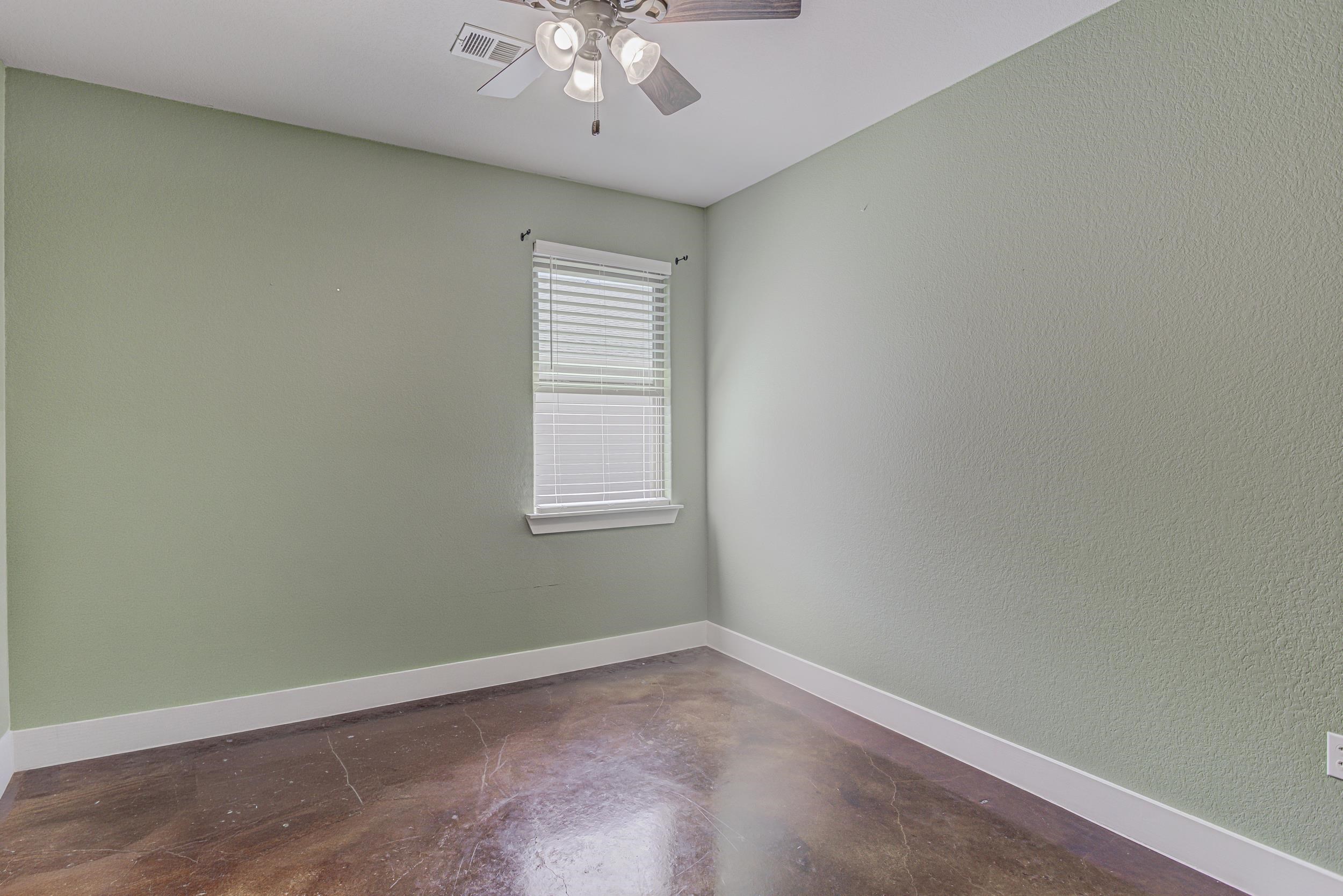 433 Dove Trail Bertram, TX 78605 - Photo 21 of 30 an empty room with a window