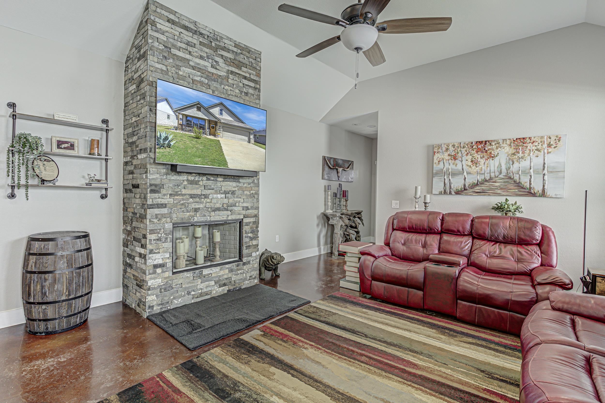 433 Dove Trail Bertram, TX 78605 - Photo 4 of 30 a living room with furniture and a fireplace