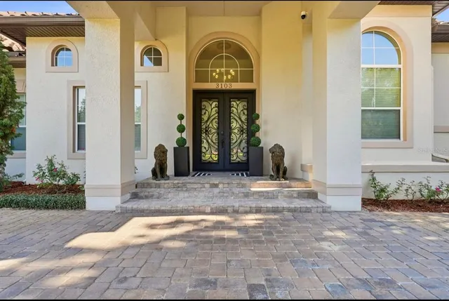 a view of a house with a big yard