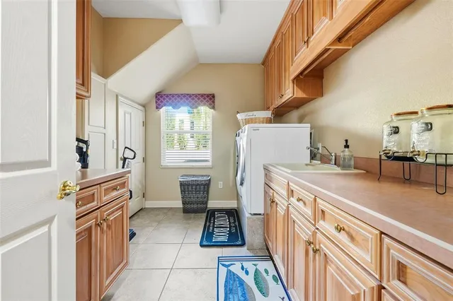 a view of a big yard with a house in the background