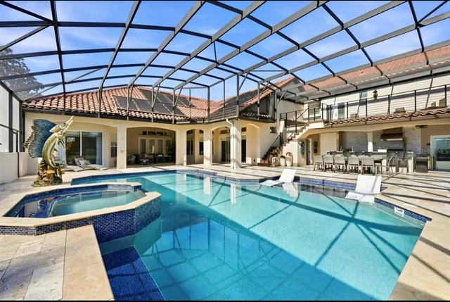 a view of outdoor space with deck and yard