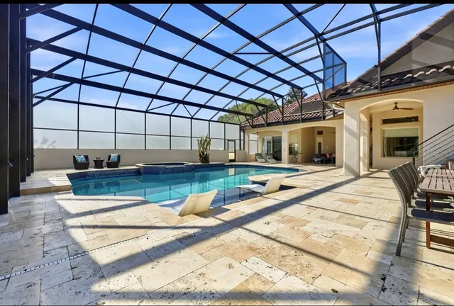 an aerial view of a house with a garden