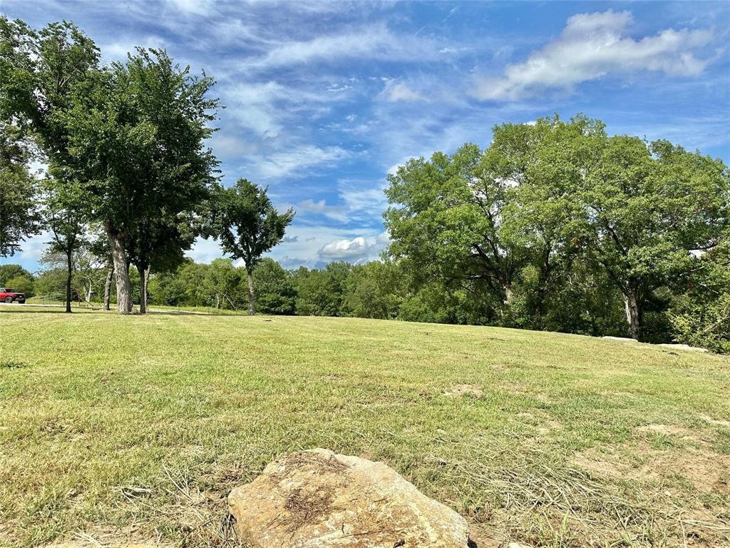 2.3-acres North Harrell Road Gainesville, TX 76240 - Photo 17 of 29 a view of a field with an trees