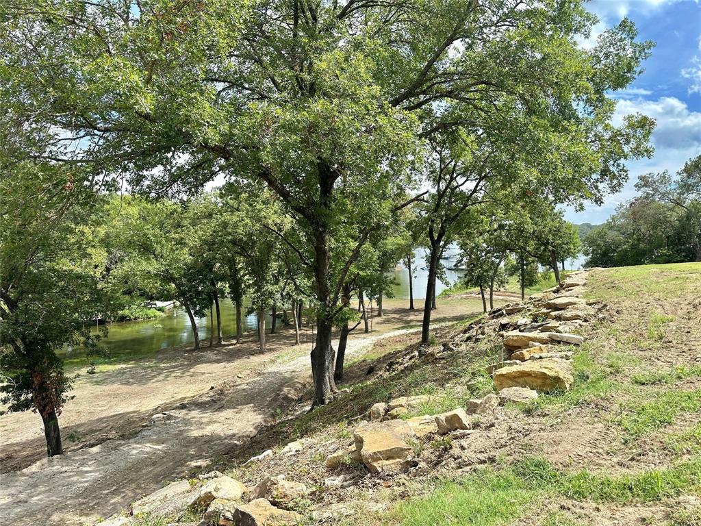 2.3-acres North Harrell Road Gainesville, TX 76240 - Photo 25 of 29 a view of outdoor space with trees