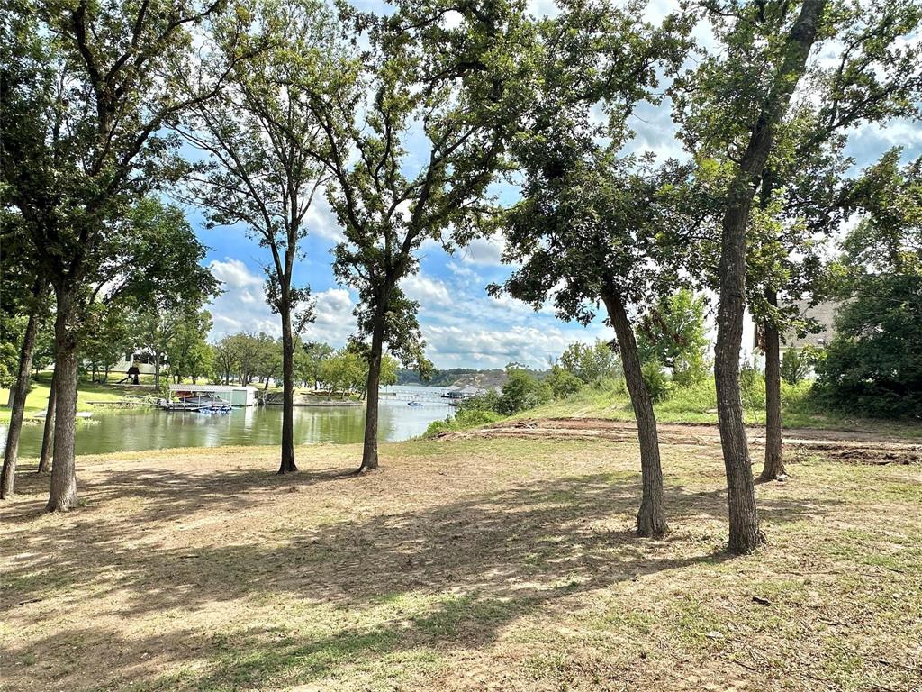 2.3-acres North Harrell Road Gainesville, TX 76240 - Photo 26 of 29 a view of a yard with a tree
