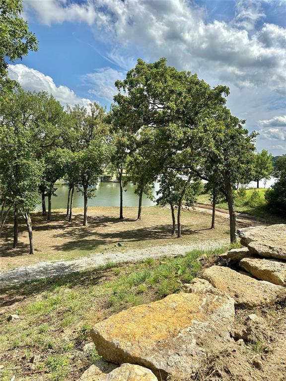 2.3-acres North Harrell Road Gainesville, TX 76240 - Photo 10 of 29 a view of a yard with a tree