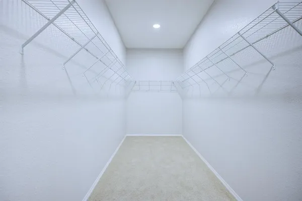 a view of a room with racks on the wall