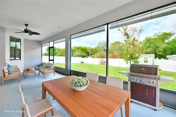 a view of a dining room and furniture window and outside view