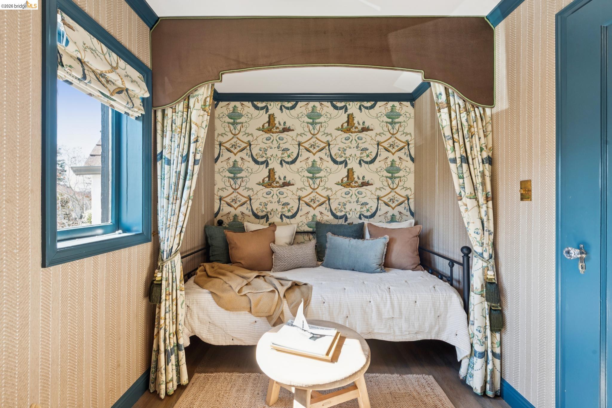 906 Paramount Road Oakland, CA 94610 - Photo 25 of 60 a living room with furniture and a large window