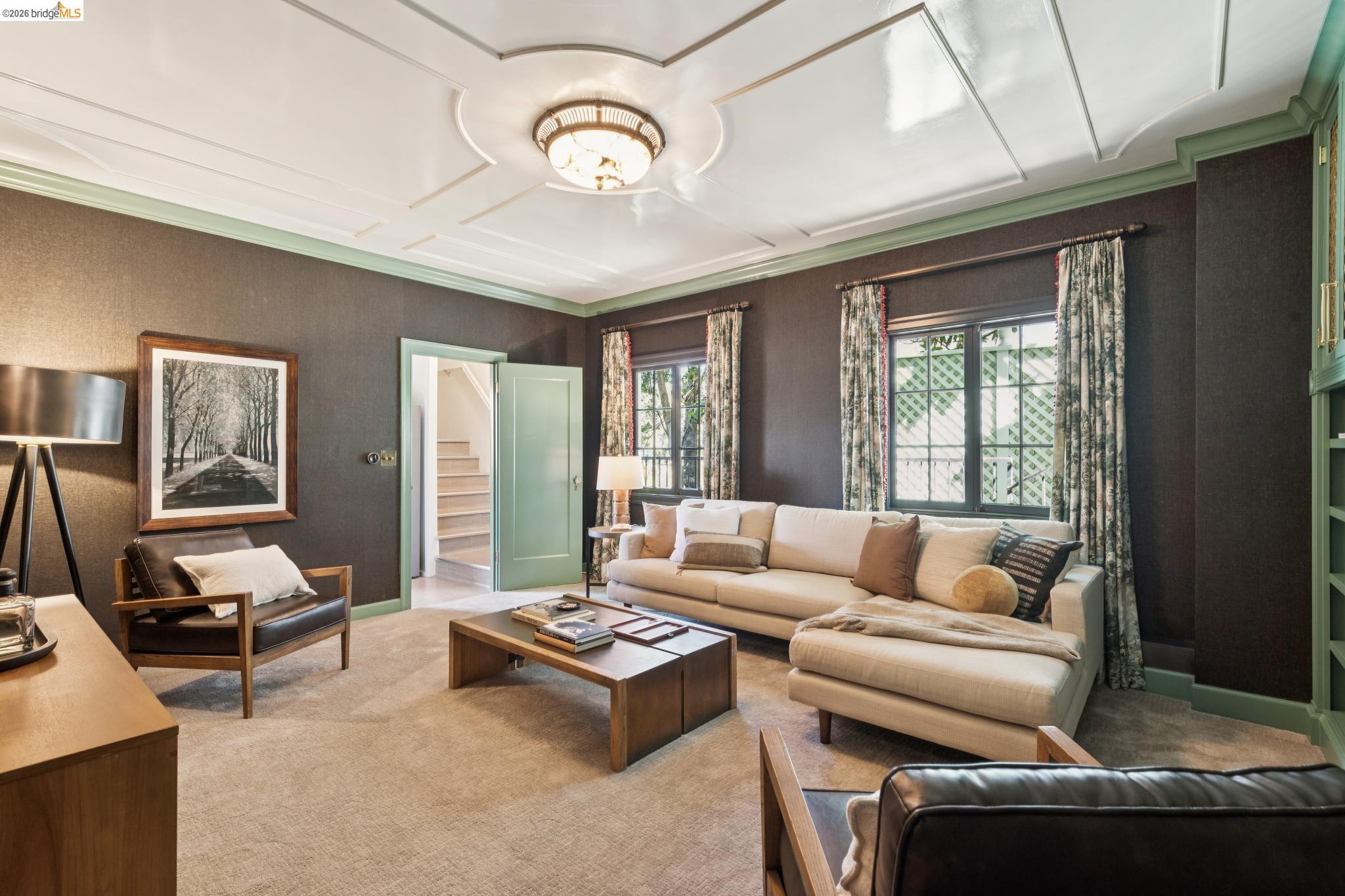 906 Paramount Road Oakland, CA 94610 - Photo 35 of 60 a living room with furniture and a large window