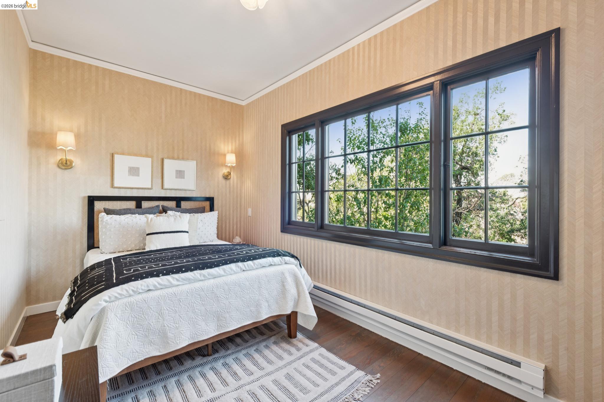 906 Paramount Road Oakland, CA 94610 - Photo 37 of 60 a bedroom with a large bed and a window