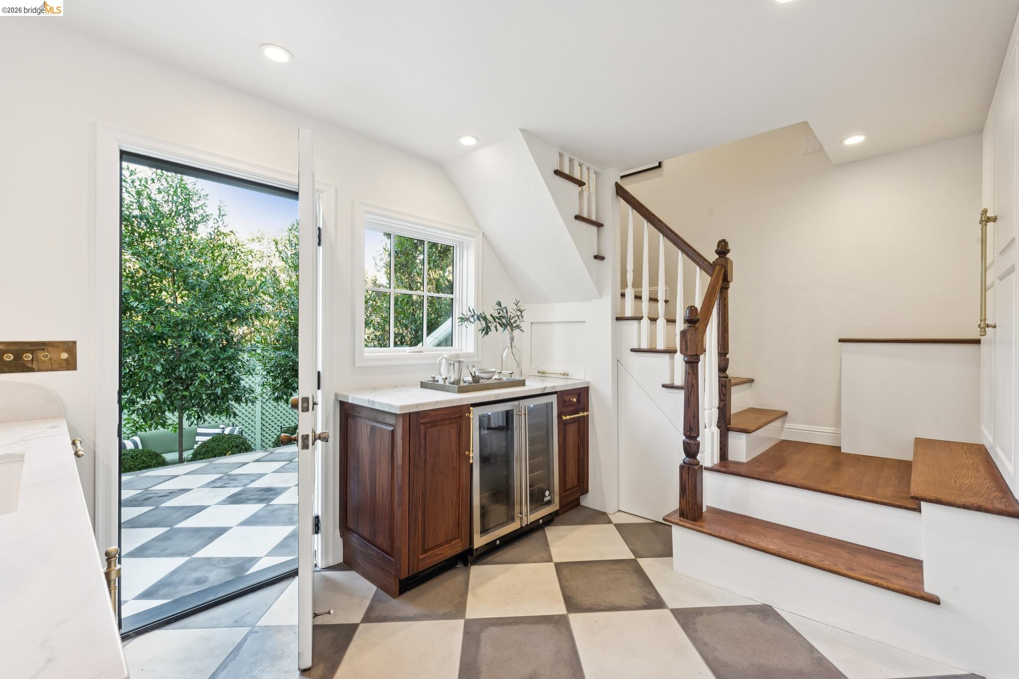 906 Paramount Road Oakland, CA 94610 - Photo 38 of 60 a kitchen with a stove a sink and a refrigerator