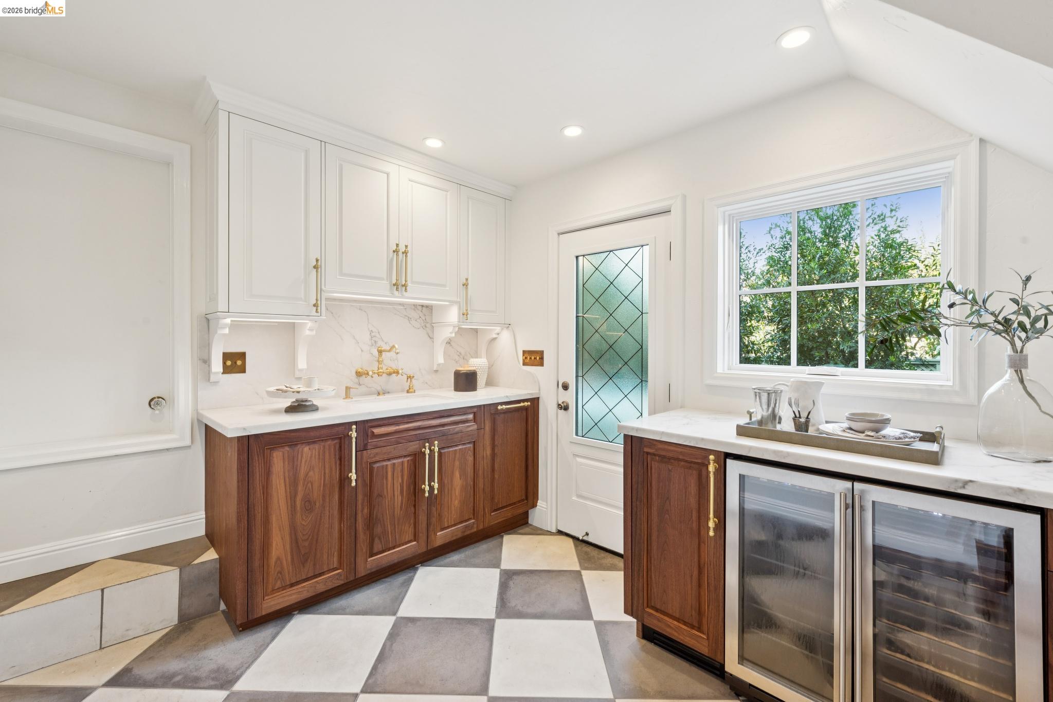 906 Paramount Road Oakland, CA 94610 - Photo 39 of 60 a kitchen with a sink stove and cabinets