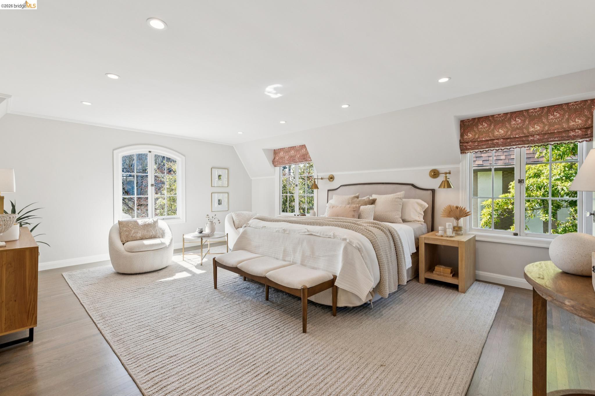 906 Paramount Road Oakland, CA 94610 - Photo 55 of 60 a bedroom with a bed and large window