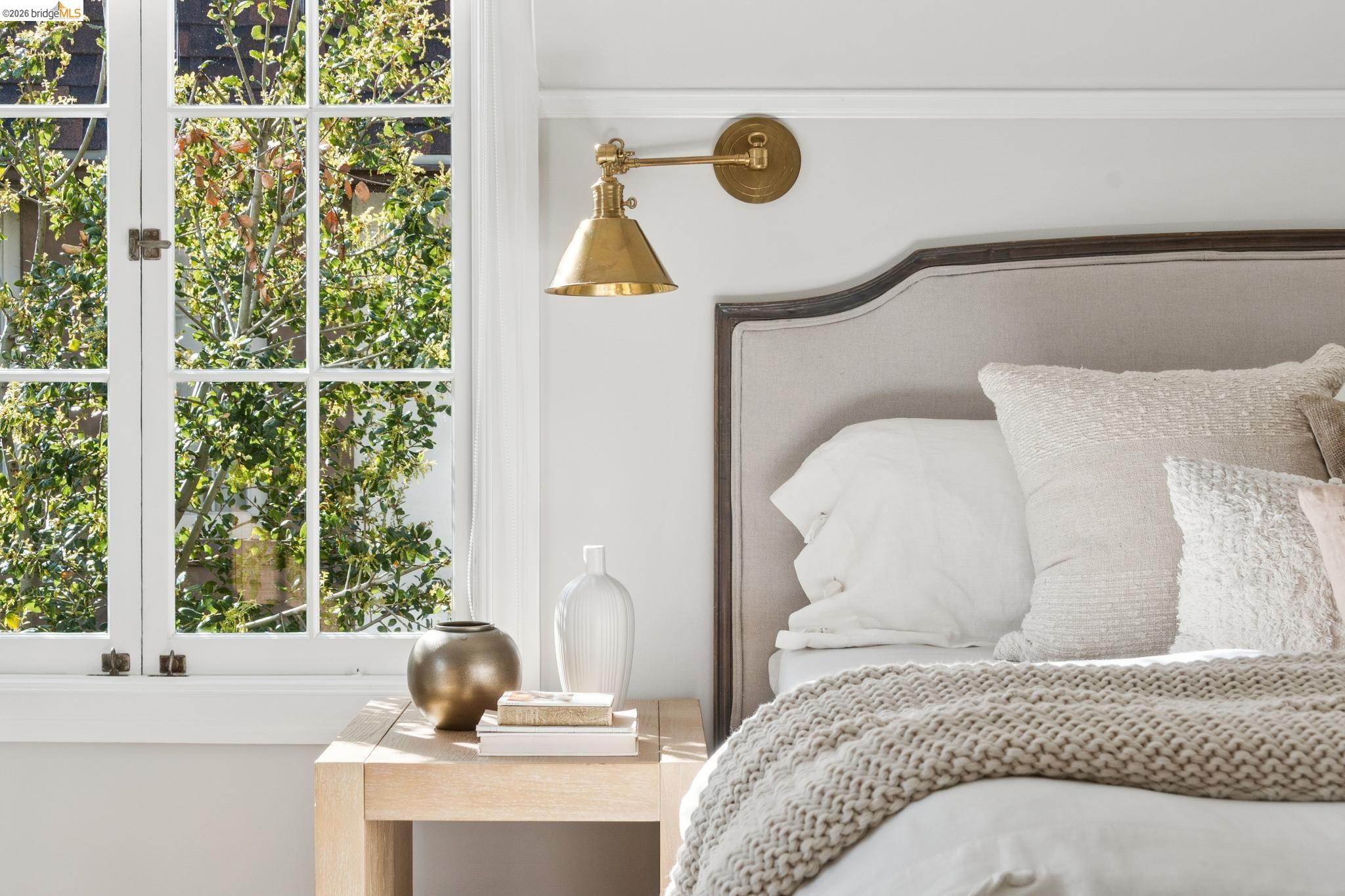 906 Paramount Road Oakland, CA 94610 - Photo 57 of 60 a bedroom with a bed and window