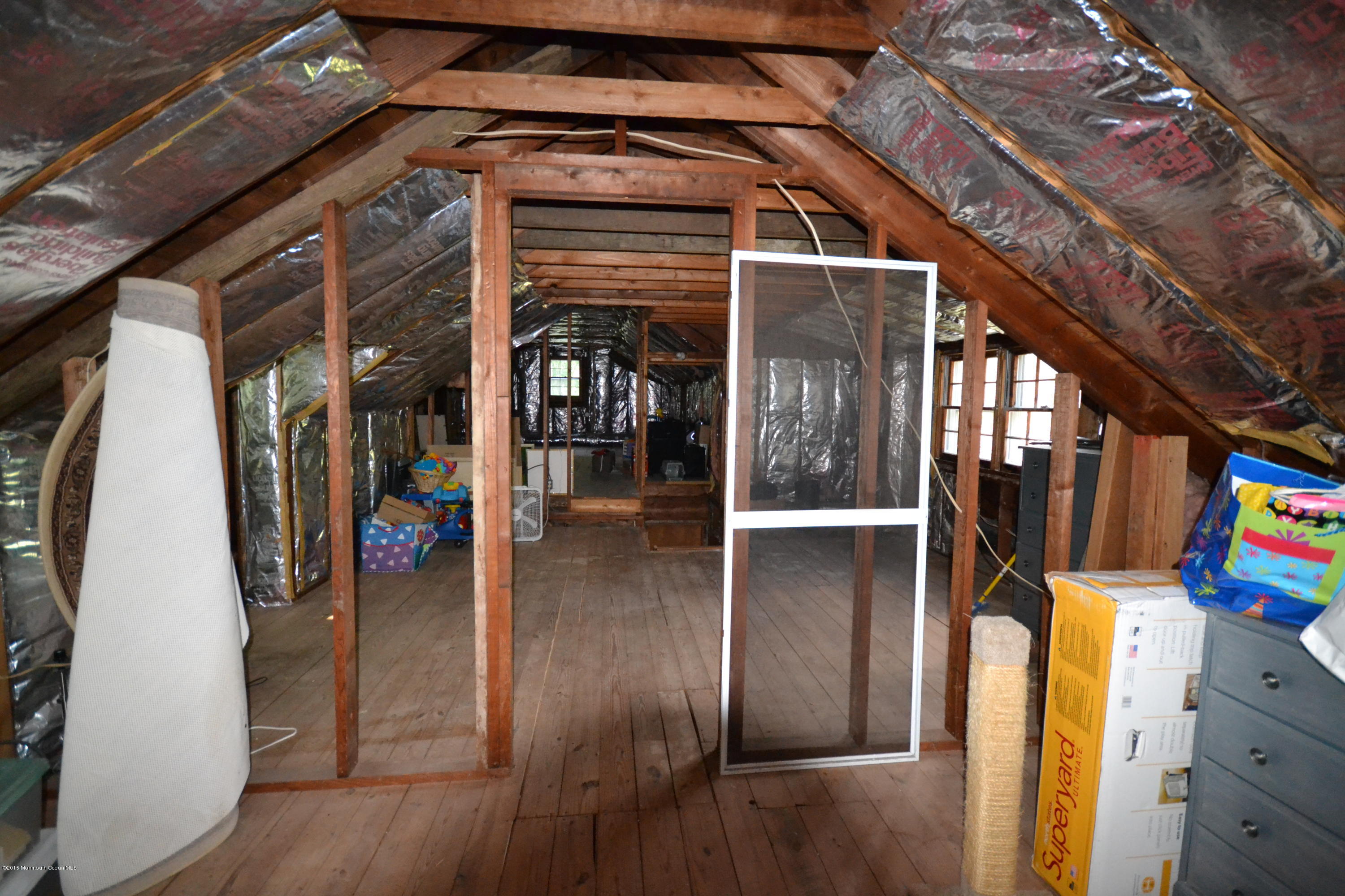 4 Spring Lane Warren, NJ 07059 - Photo 16 of 22 a view of water heater room with wooden floor