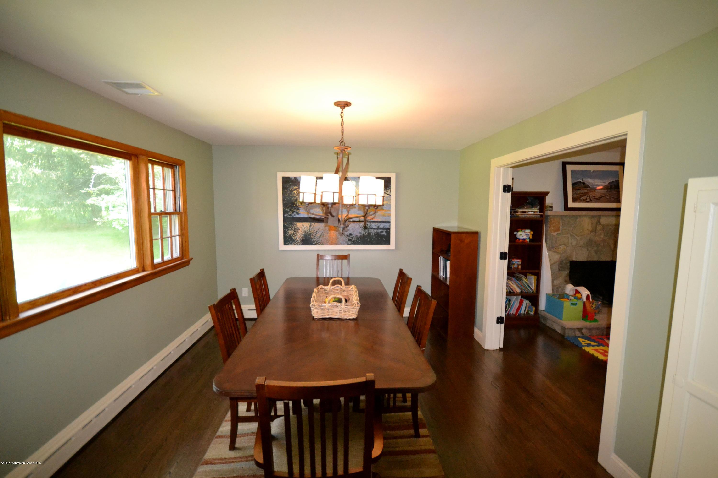 4 Spring Lane Warren, NJ 07059 - Photo 6 of 22 a view of a dining room with furniture window and wooden floor