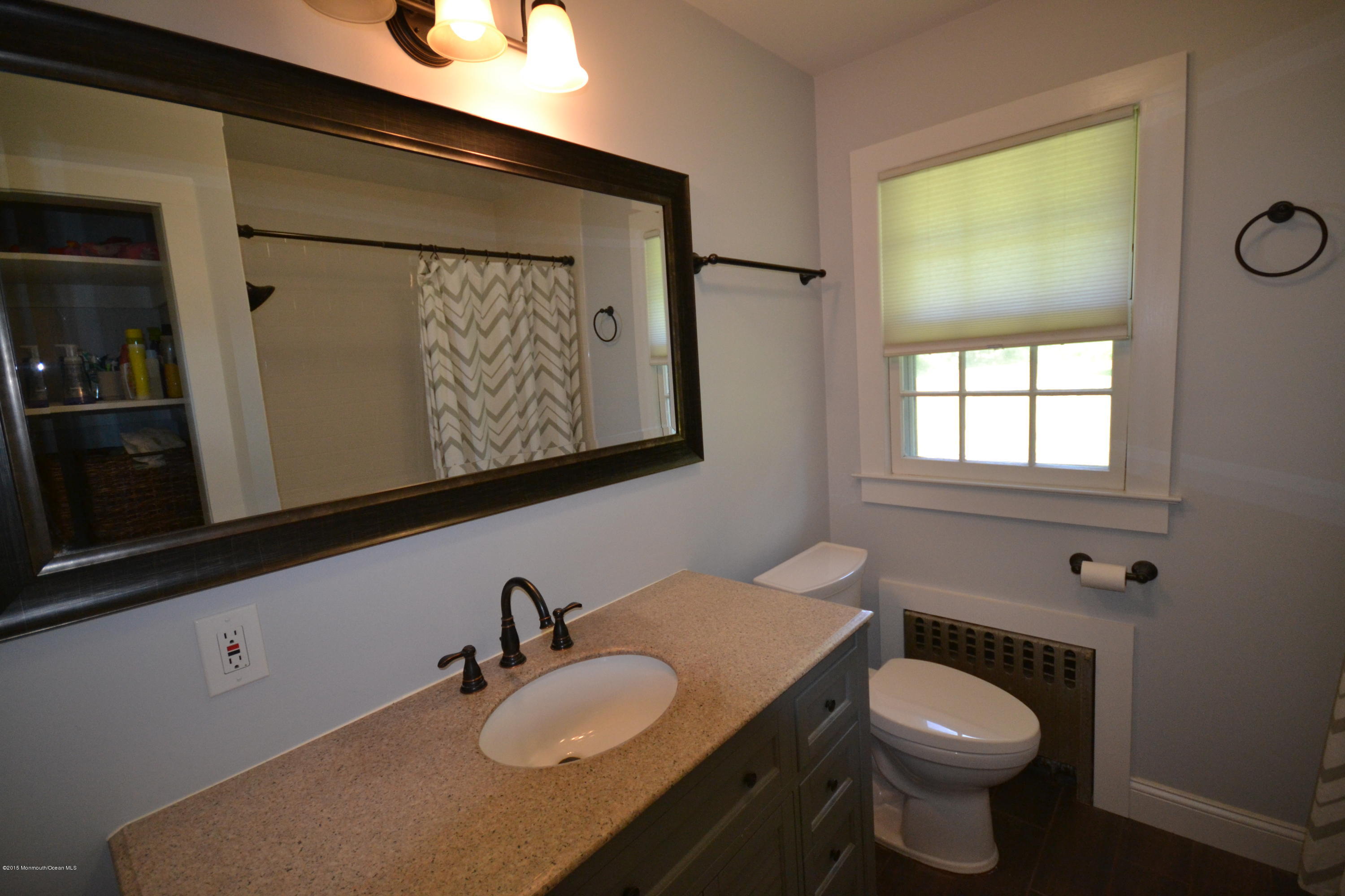 4 Spring Lane Warren, NJ 07059 - Photo 7 of 22 a bathroom with a sink toilet and vanity