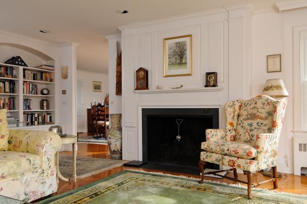 155 Ice Valley Road Osterville, MA 02655 - Photo 11 of 19 a living room with furniture and a fireplace