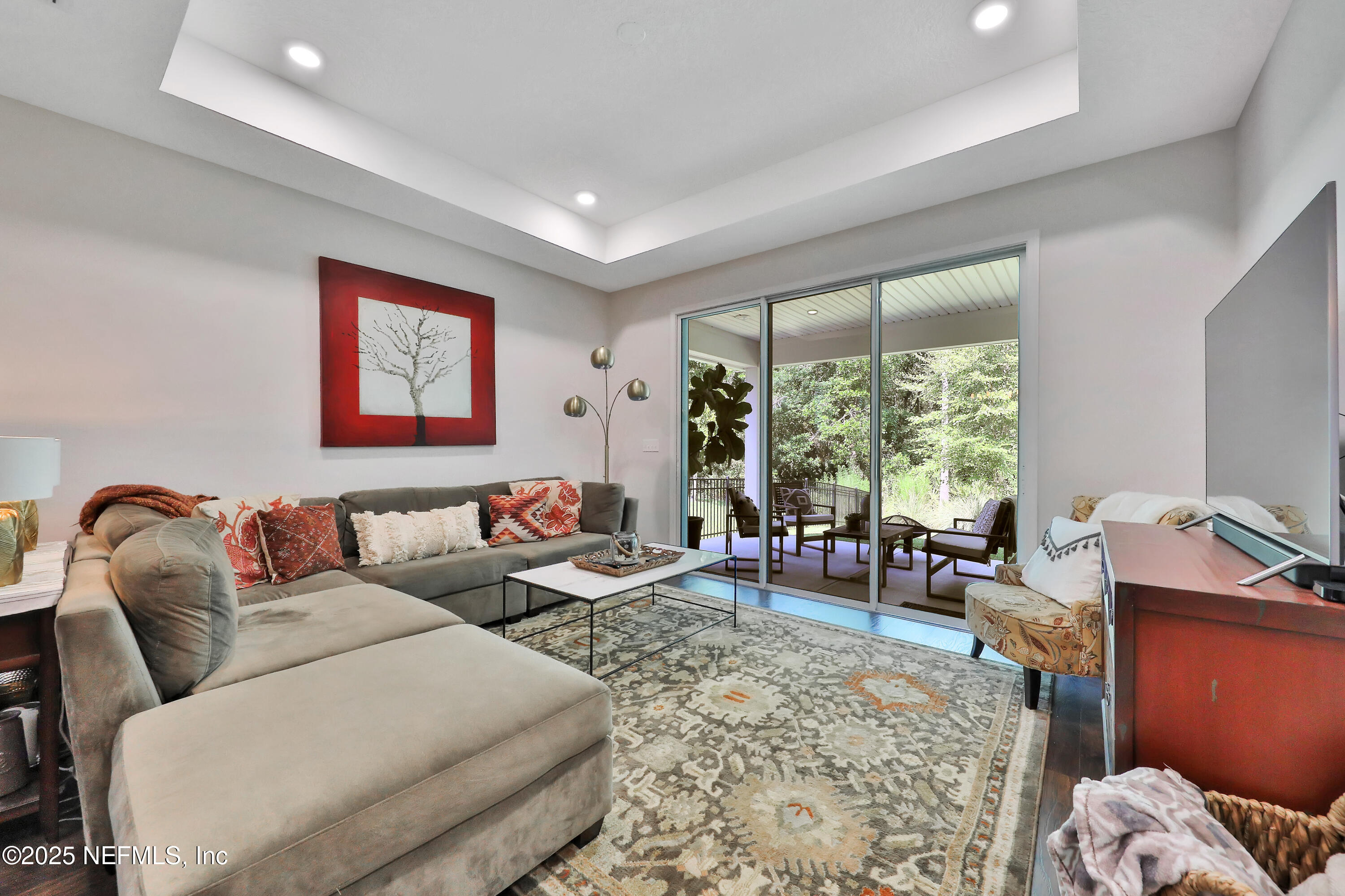 123 Bison Trail Ponte Vedra, FL 32081 - Photo 11 of 23 a living room with furniture and a large window