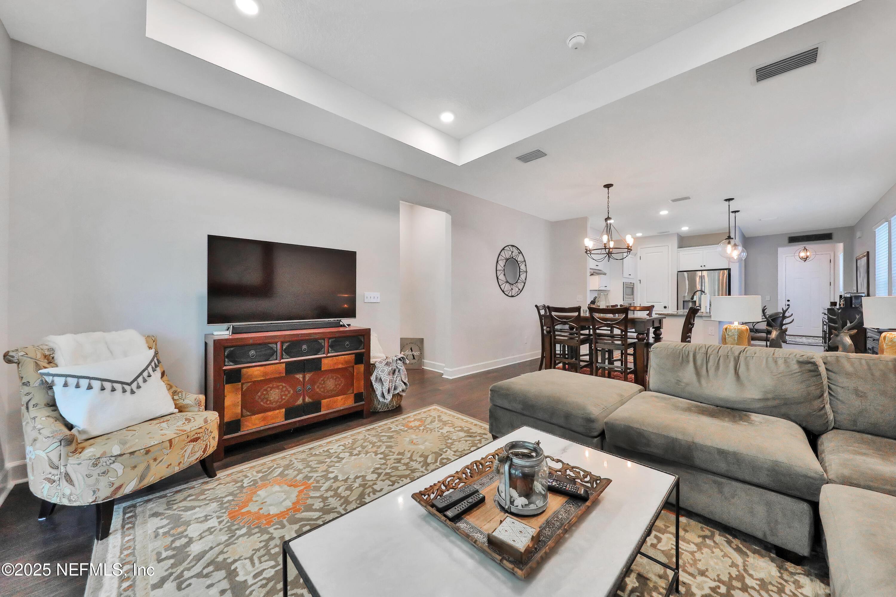123 Bison Trail Ponte Vedra, FL 32081 - Photo 13 of 23 a living room with furniture and a flat screen tv