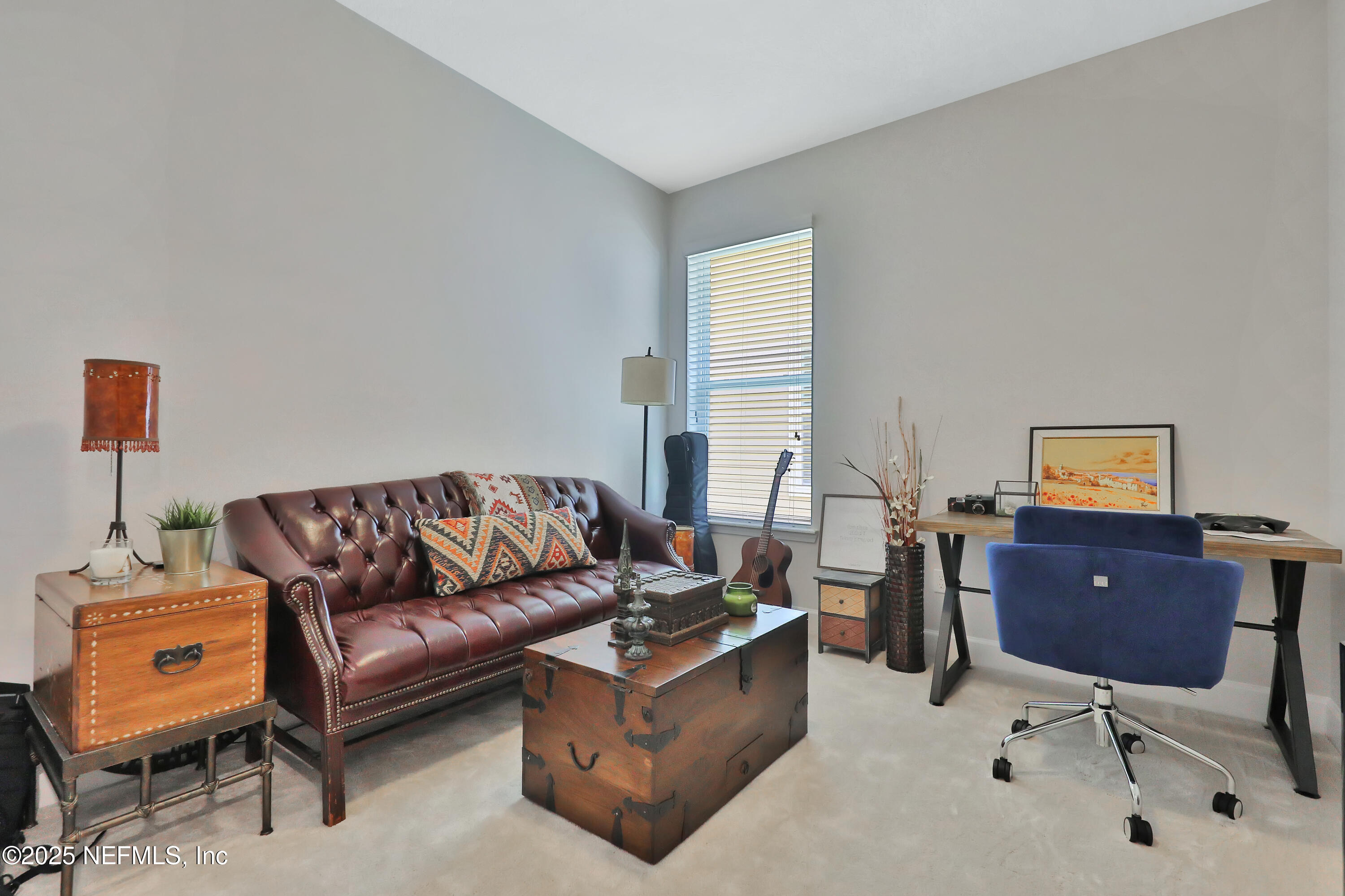 123 Bison Trail Ponte Vedra, FL 32081 - Photo 4 of 23 a living room with furniture and a window