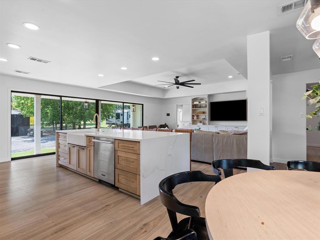 946 Burke Road Gunter, TX 75058 - Photo 12 of 38 a living room with furniture and a flat screen tv