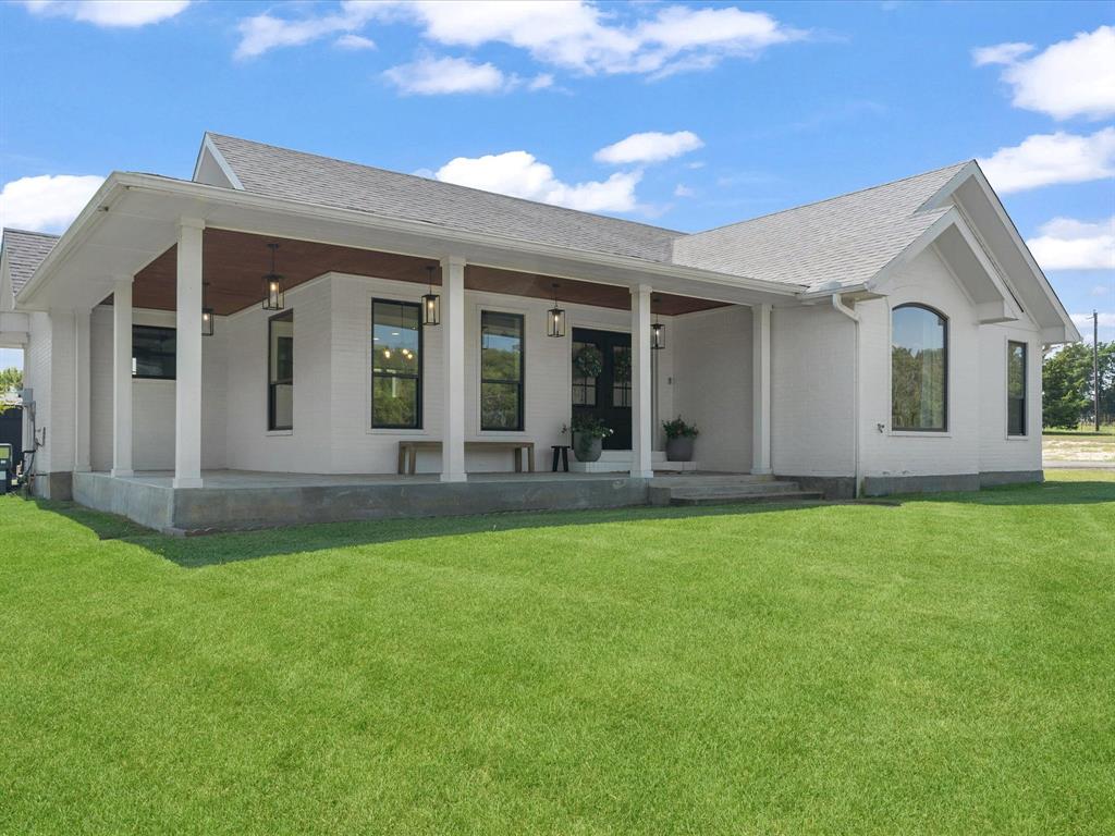 946 Burke Road Gunter, TX 75058 - Photo 2 of 38 a view of a house with a backyard
