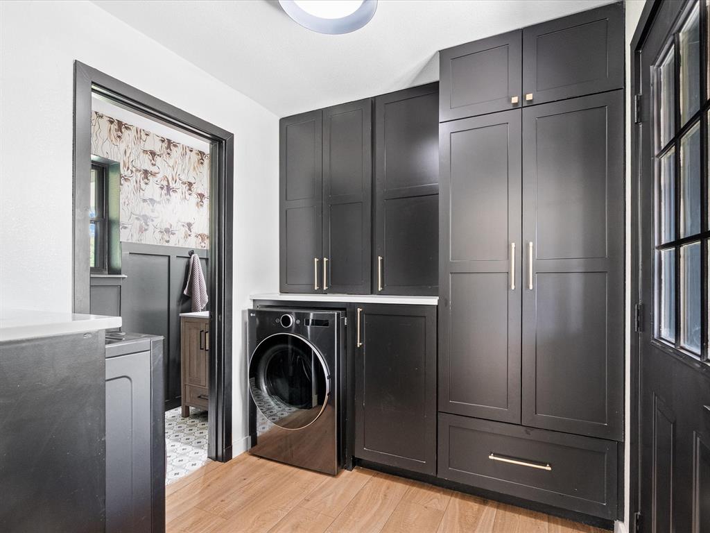 946 Burke Road Gunter, TX 75058 - Photo 22 of 38 a view of a kitchen with washer and dryer