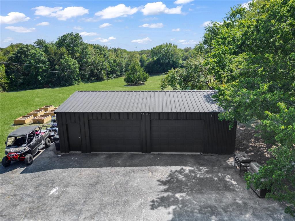 946 Burke Road Gunter, TX 75058 - Photo 28 of 38 a view of a house with a yard