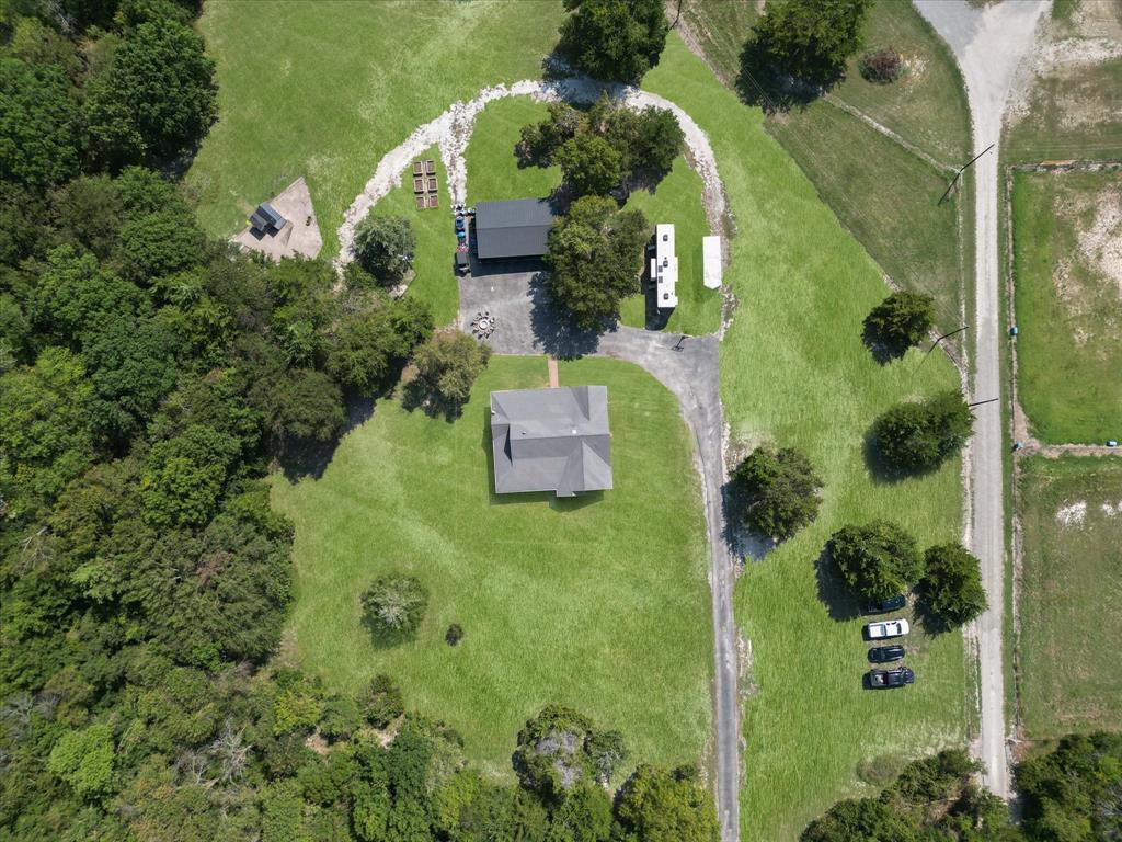 946 Burke Road Gunter, TX 75058 - Photo 32 of 38 an aerial view of a house with a yard and garden