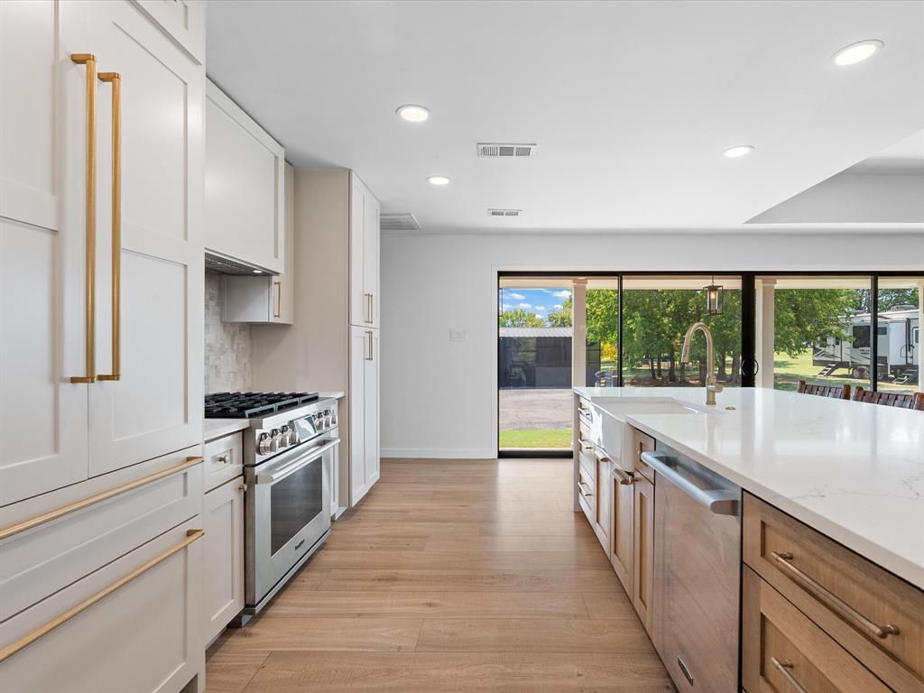 946 Burke Road Gunter, TX 75058 - Photo 4 of 38 an open kitchen with a large window