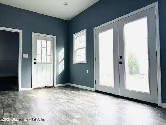 an empty room with windows