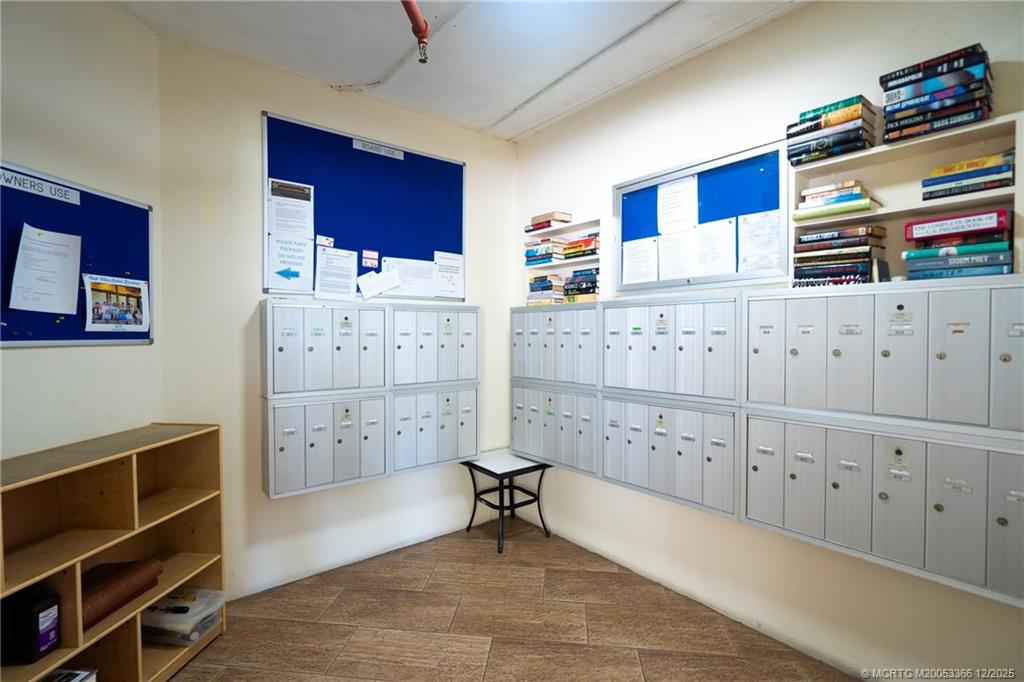 221 Northeast Plantation Road, Unit 407 Stuart, FL 34996 - Photo 6 of 42 a view of kitchen with cabinet