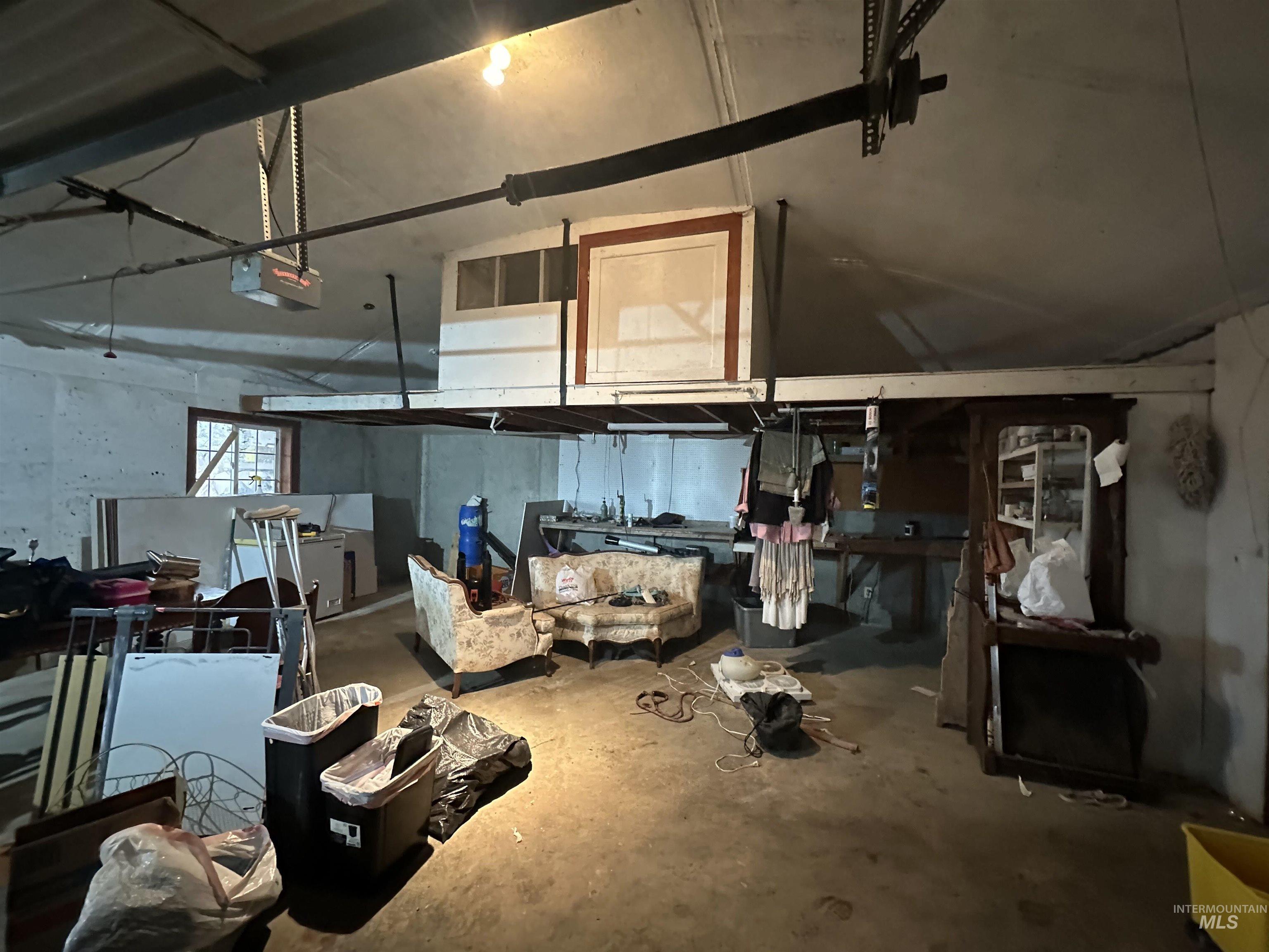 5860 Akron Road New Plymouth, ID 83655 - Photo 23 of 33 Garage featuring a garage door opener